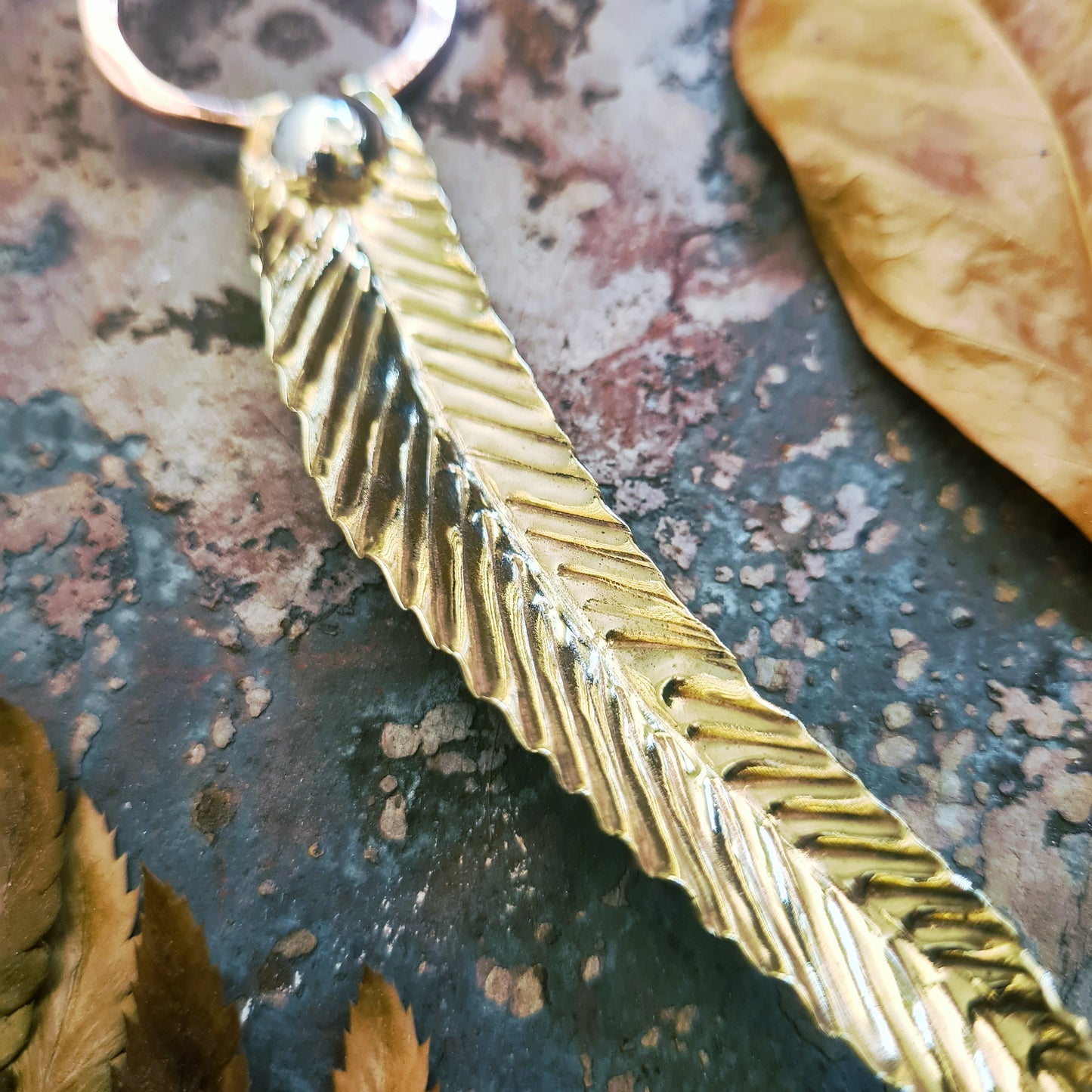 Eucalyptus Leaf pendant in recycled Brass, Copper and Silver